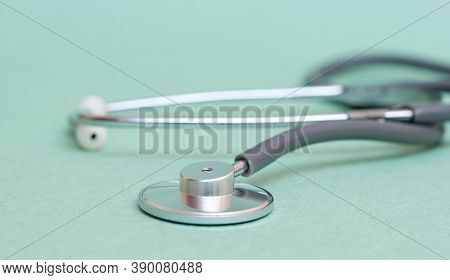 Stethoscope On Blue Background. Close-up Of Stethoscope