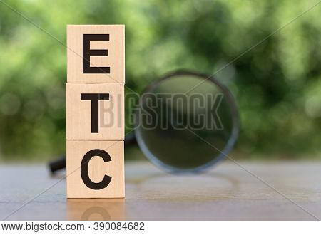 Alphabet Letter In Word Etc Abbreviation Of Et Cetera On Wood Background
