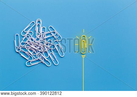Great Ideas Concept With Paperclip,thinking,creativity,light Bulb On Blue Background,new Ideas Conce