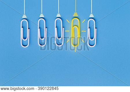 Great Ideas Concept With Paperclip,thinking,creativity,light Bulb On Blue Background,new Ideas Conce