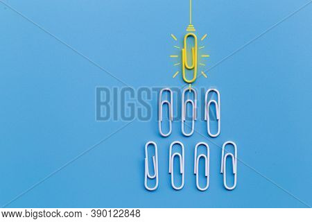 Great Ideas Concept With Paperclip,thinking,creativity,light Bulb On Blue Background,new Ideas Conce