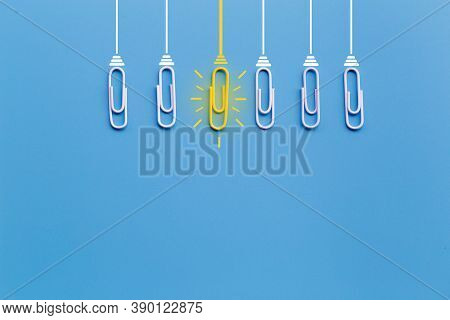 Great Ideas Concept With Paperclip,thinking,creativity,light Bulb On Blue Background,new Ideas Conce