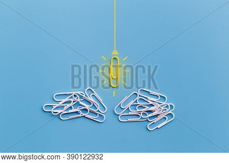 Great Ideas Concept With Paperclip,thinking,creativity,light Bulb On Blue Background,new Ideas Conce