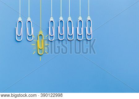 Great Ideas Concept With Paperclip,thinking,creativity,light Bulb On Blue Background,new Ideas Conce