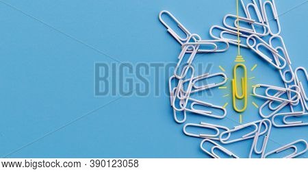 Great Ideas Concept With Paperclip,thinking,creativity,light Bulb On Blue Background,new Ideas Conce