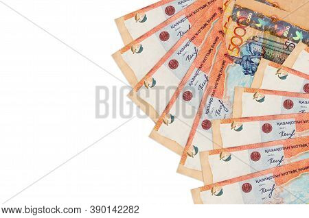 5000 Kazakhstani Tenge Bills Lies Isolated On White Background With Copy Space. Rich Life Conceptual