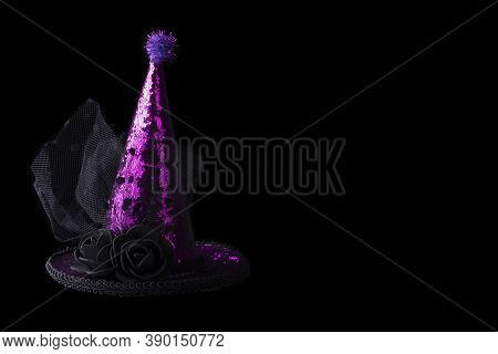 Halloween Hat Shiny On Black Background.bright Cap On The Hoop.