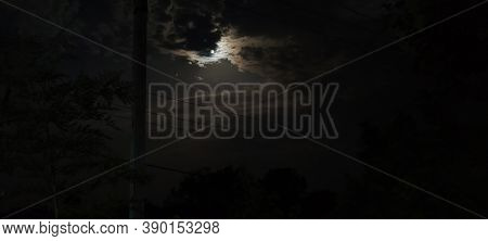 Full Moon In Clouds