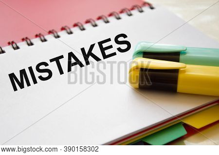 The Word Error Is Written On A White Piece Of Paper With Cardaches. Mistakes In Business And Educati