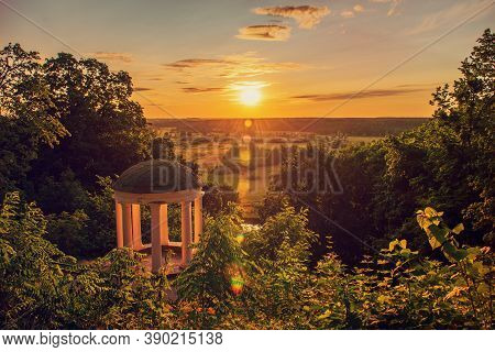Old Pavilion In A Picturesque Location With Green Trees And Sun Shining. Sednev.ukraine