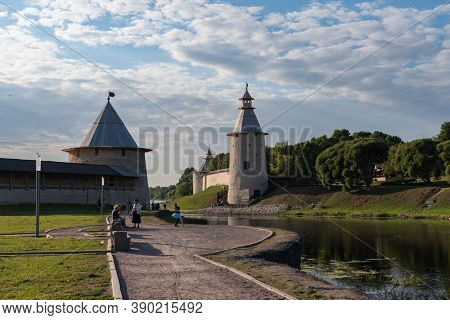 Pskov, Russia: August 21, 2020: Pskova River Embankment. Pskov Kremlin Towers And Wall.