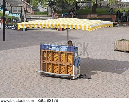 Bristol, Uk - August 17, 2017: A Man Plays A Piano Which Is Part Of 