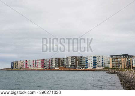 Apartment Buildings On The Coastline In Port Of Hafnarfjordur In Iceland