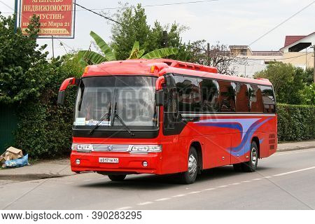 Sochi, Russia - July 18, 2009: Red Touristic Coach Bus Asia Granbird In The City Street.
