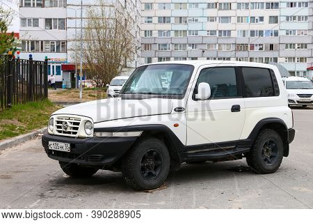 Novyy Urengoy, Russia - May 21, 2020: White Compact Crossover Ssangyong Korando In The City Street.