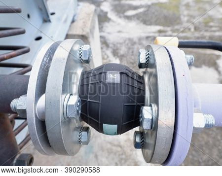 Condenser Water Pipelines With Pressure Gauge And Rubber Vibration Damper.  Pipes And Red Valves Of 