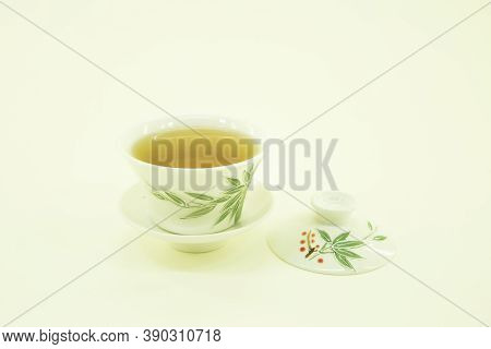 Russian Tea. Blooming Sally. Ivan-tea. Tea In A Beautiful Traditional Oriental Cup With Saucer.