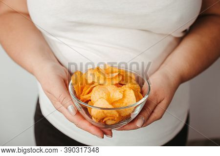 Processed Food, Unhealthy Diet, Imbalanced Ration. Overweight Woman Eating Salted Fattening Potato C