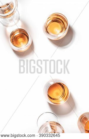 White Wine Glasses On Wine Tasting. Degustation Different Varieties Of White Wine Concept. White Bac