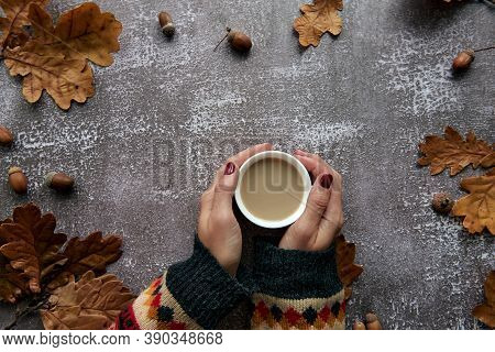Autumn Composition. Frame Made Of Pumpkins, Dried Leaves, Pine Cones And Tes Cup Background. Templat