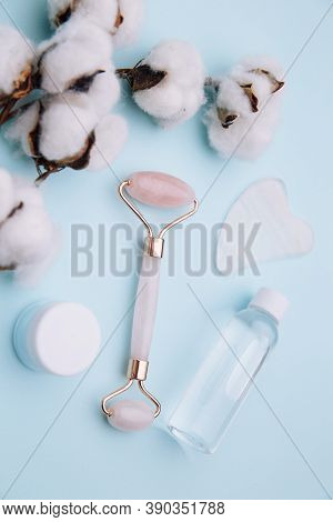 Selfcare, Relaxation And Beauty Care Concept. Modern Apothecary Or Home Spa Composition On Blue Back