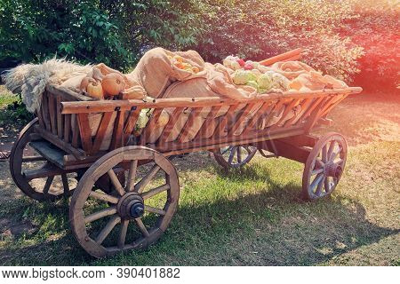 Large Vintage Cart With Vegetables And Fruits On A Hot Summer Day. The Food Was Brought To The Marke