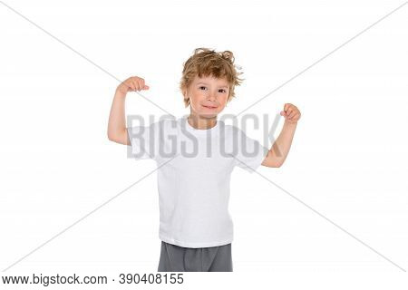 The Boy Is Dressed In A White T-shirt And Stands On An Isolated White Background Shows How Strong He