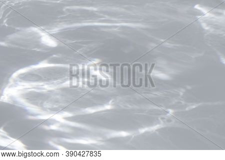 Shadow And Light Caustic Effect On A White Wall