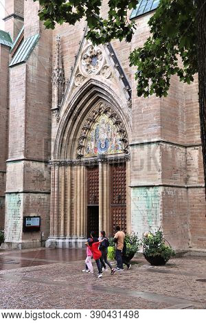 Linkoping, Sweden - August 25, 2018: People Visit The Romanesque Cathedral In Linkoping, Sweden. The