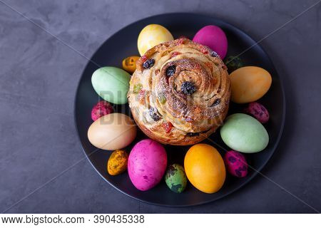 Craffin (cruffin) With Raisins, Nuts And Candied Fruits. Easter Bread Kulich And Painted Eggs. Easte