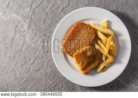 San Jacobo Steak Filled With Cheese And Ham On Gray Stone. Top View. Copy Space