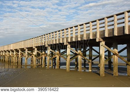 Long Wooden Bridge Stretching Over Duxbury Bay.