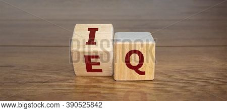 Wooden Cubes With The Expression 'iq' 'intelligence Quotient' To 'eq' 'emotional Intelligence Quotie