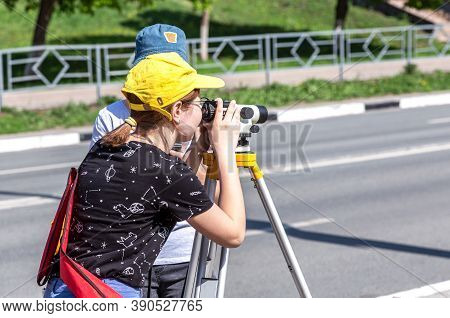 Samara, Russia - June 12, 2019: Surveyor Engineer Worker Making Measuring With Geodetic Optical Leve
