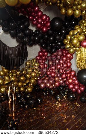 The Wall Is Decorated With Purple And Black Balloons. Halloween Decor.