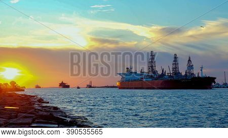Port Aransas, Tx - 21 Feb 2020: Beautiful Sunset With Three Oil Tanker Ships Approaching From Corpus