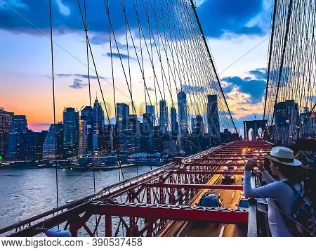 10/19/2020 - New York, Ny: A Traffic Of Cars And People Flow Back And Forth On The Brooklyn Bridge A