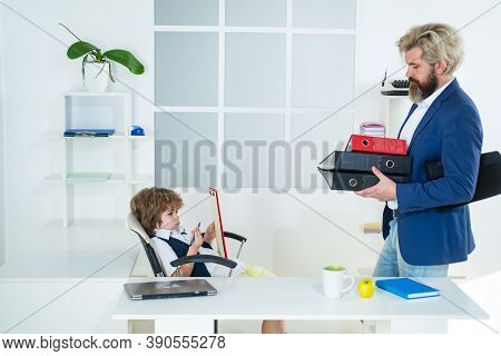 Boss And Employee. Boss And Businessman Working Together In Office. Little Boss And Mature Employee 