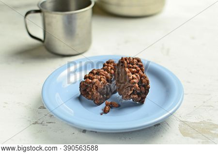 Cracker And Coffee On The Wooden Chopping Board On The Table