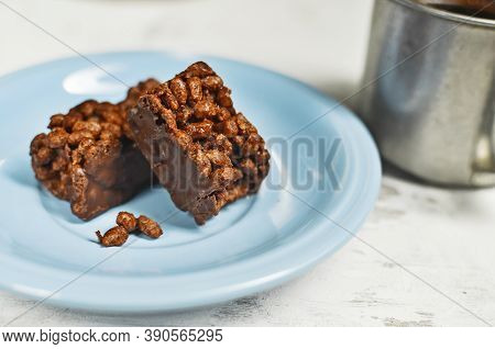 Cracker And Coffee On The Wooden Chopping Board On The Table