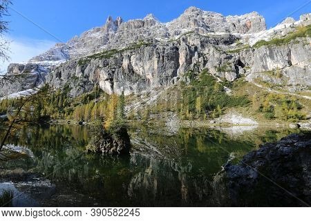 Autumn In The Dolomites, View Of Federa Lake Surrounded By Mountains. High Quality Photo