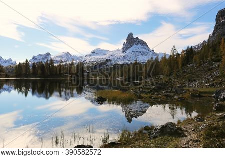 Autumn In The Dolomites, View Of Federa Lake Surrounded By Mountains. High Quality Photo
