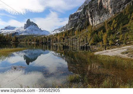 Autumn In The Dolomites, View Of Federa Lake Surrounded By Mountains. High Quality Photo