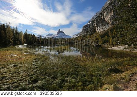 Autumn In The Dolomites, View Of Federa Lake Surrounded By Mountains. High Quality Photo