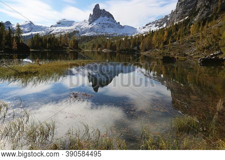 Autumn In The Dolomites, View Of Federa Lake Surrounded By Mountains. High Quality Photo