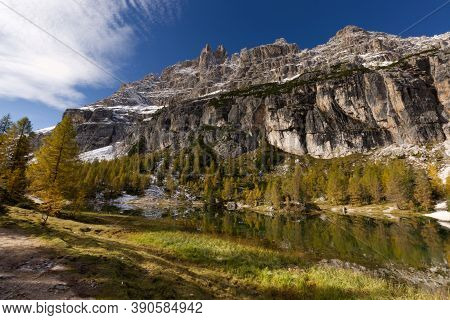 Autumn In The Dolomites, View Of Federa Lake Surrounded By Mountains. High Quality Photo