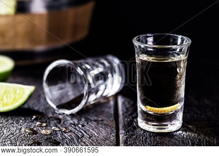 Several Glasses With Mezcal (or Mescal) Is Commonly Known As Tequila With Larvae Or Worm, An Exotic