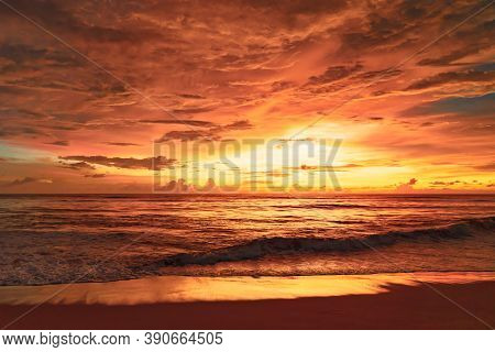 View Of Beautiful Glorious Golden Sunset And Golden Hour Above The Sea In Evening.