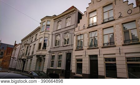 Bruges, Belgium - May 12, 2018:  Roofs And Windows Of Old Authentic Brick Houses On Street Sint-jako