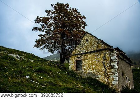 Typical Rural Building In Autumn In The Regional Park Of The Lessini Mountains Near Campofontana, Ve